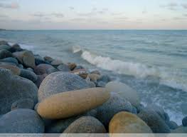 Basalt rocks by lake
