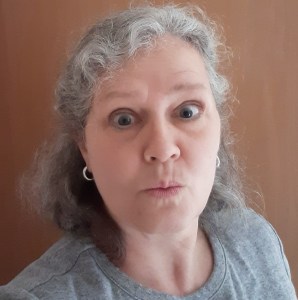 Goofy headshot of the author, surprised. Hello!