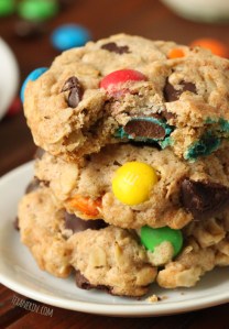 Stack of three M and M cookies, bite out of one